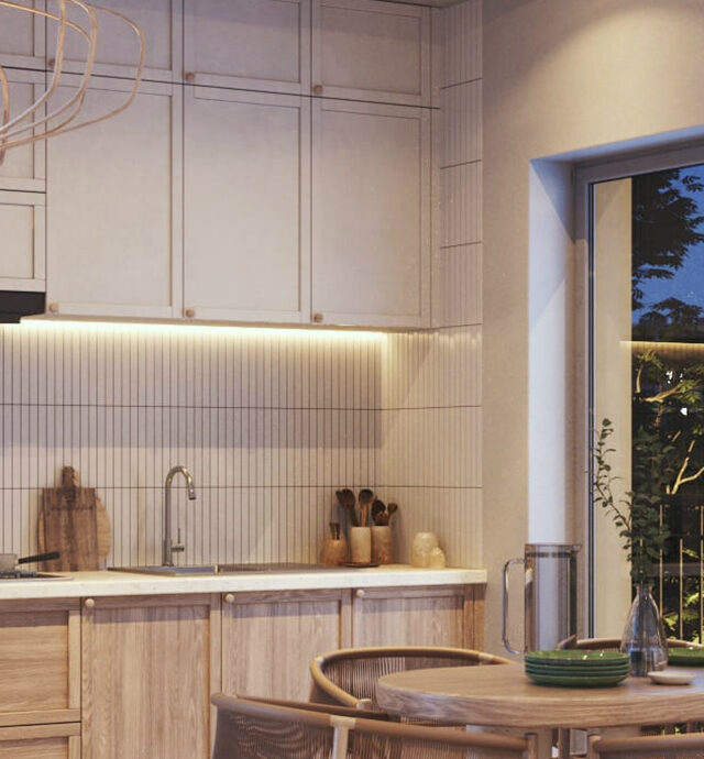 Moderne Küche mit warmem Licht, Holzdetails und stilvoller Beleuchtung, die den Raum gemütlich und einladend gestaltet.