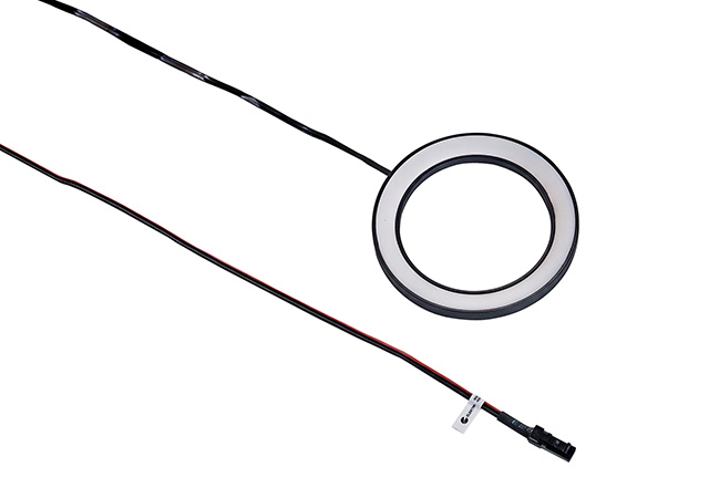 Ein flexibles LED-Beleuchtungselement mit kreisförmigem Design und Anschlusskabel für kreative Lichtlösungen