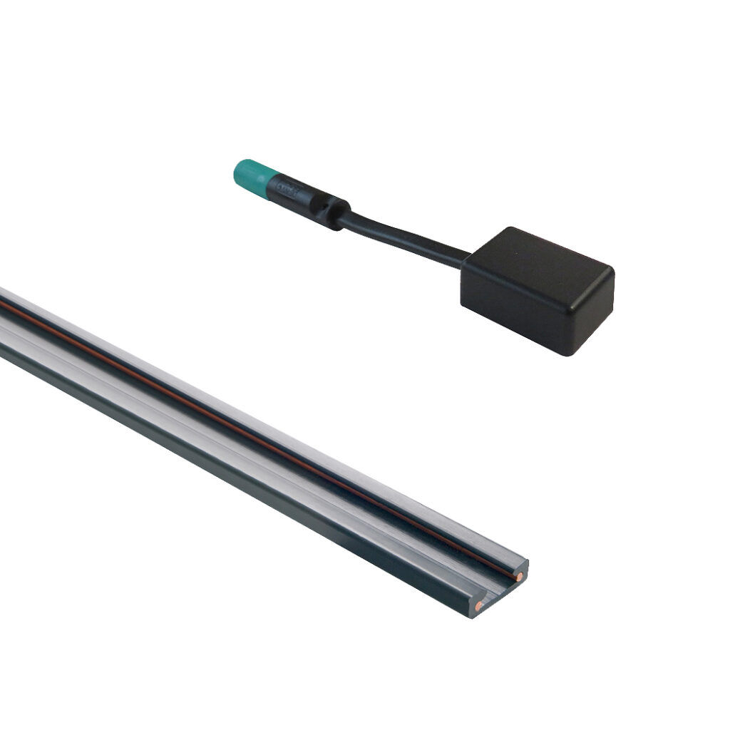 Die Abbildung zeigt eine moderne Micro-Stromschiene mit einem Stromabnehmer, ideal für effiziente Beleuchtungssysteme.