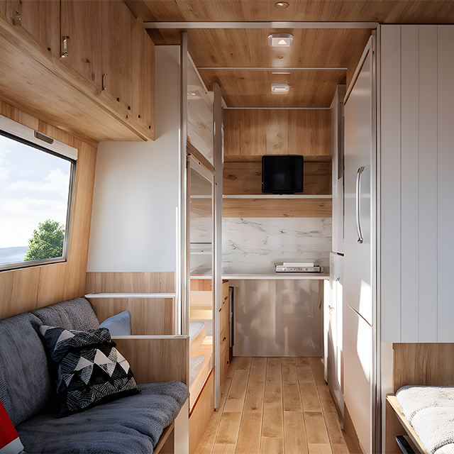 Der Innenraum eines modernen Micro-Wohnwagens mit Holzdetails und gemütlicher Sitzecke lädt zum Entspannen ein.